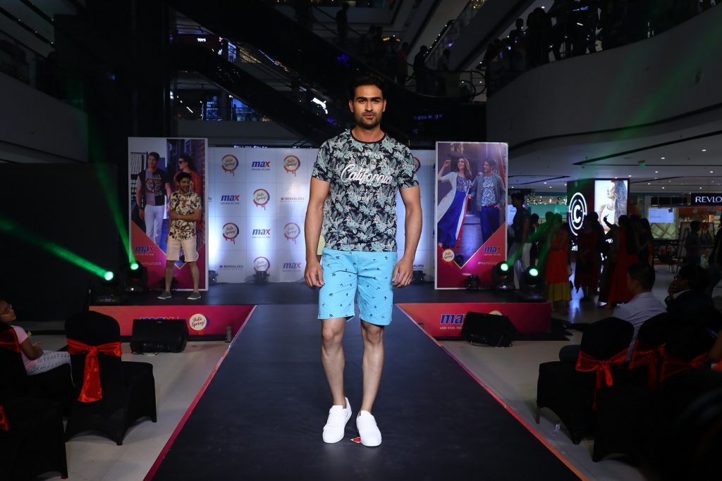 Model walking the ramp showcasing the FUN theme