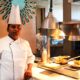 chef poses at food fest at renaissance