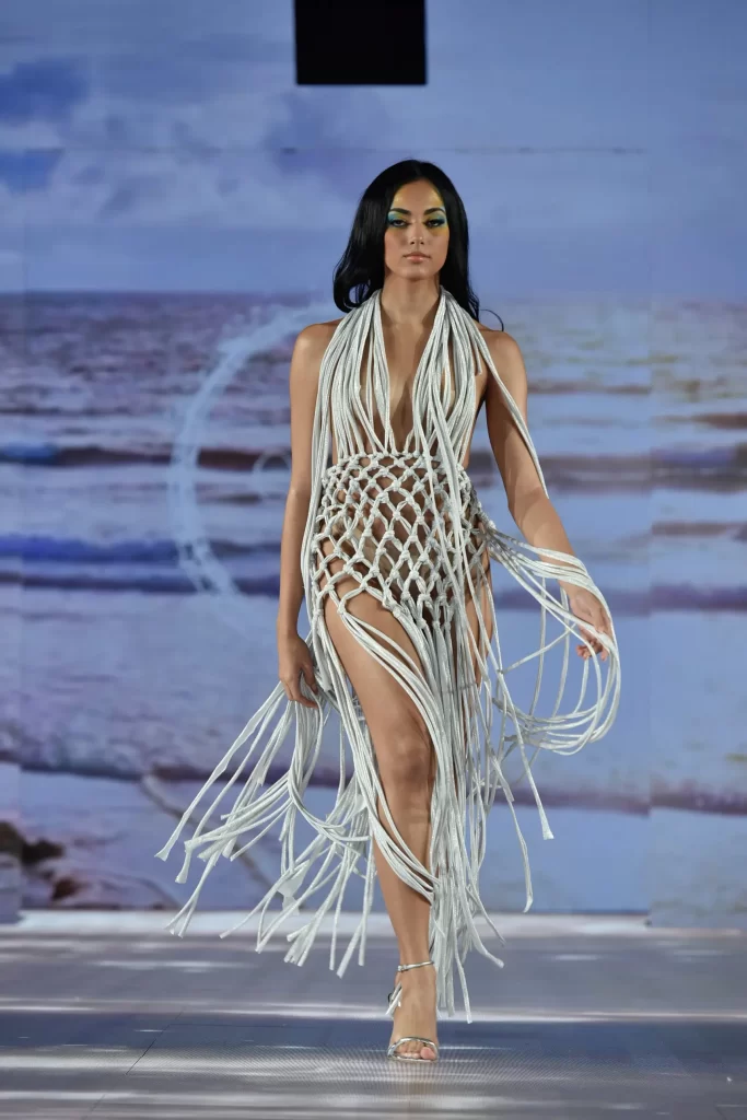 A model walks at New York Fashion Week runway editorial by Fashion Herald the top runway magazine of New York