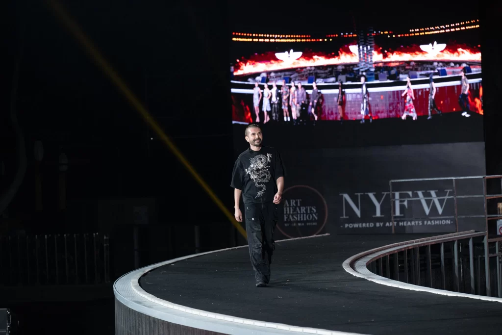 Eric Rosette of art hearts fashion walking the runway at wuxi china fashion show