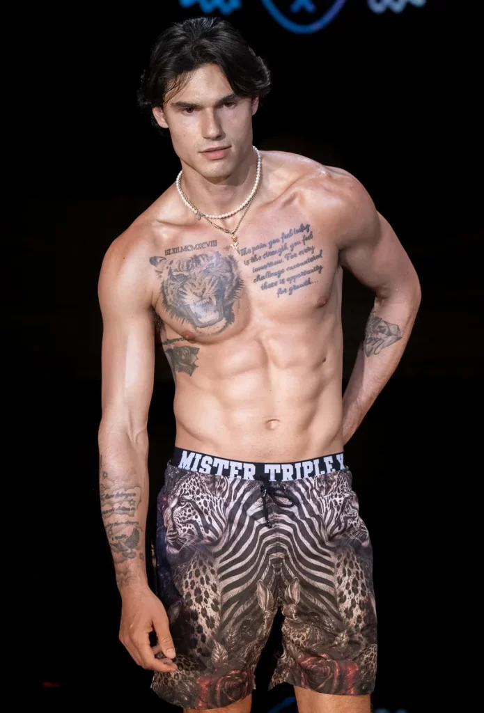A male runway model walks at Miami Swim Week 2026 - HD image