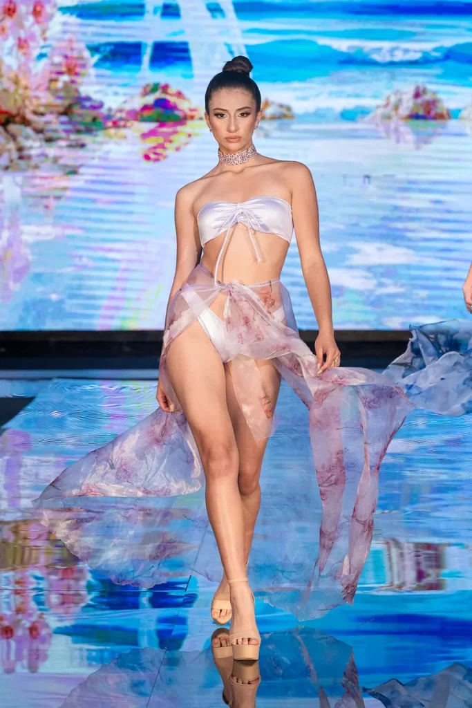 Model walking the ramp at Miami Swim Week Runway by Fashion Herald Top runway magazine miami